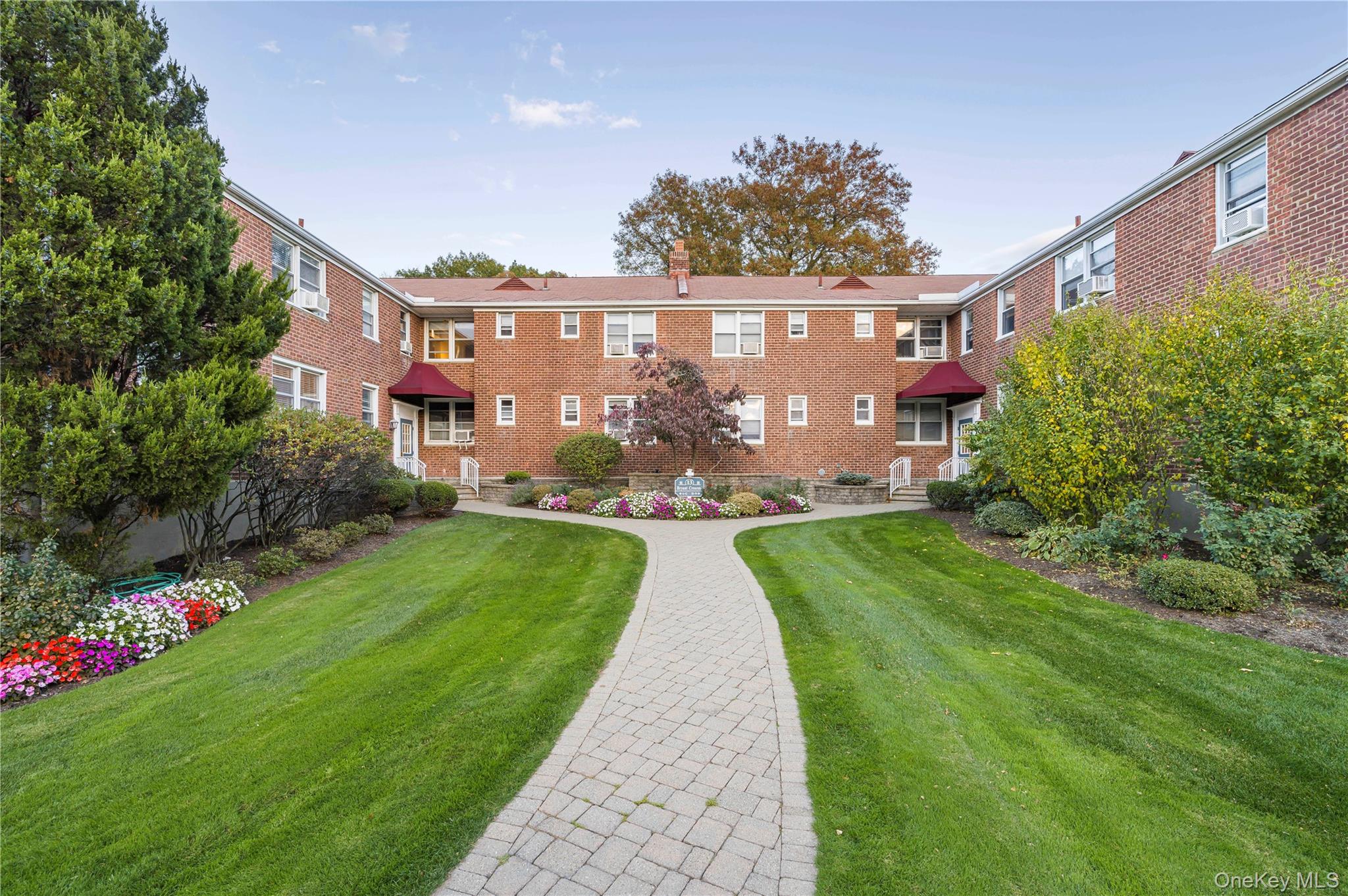Impeccably maintained first-floor 2BR unit featuring an updated kitche...