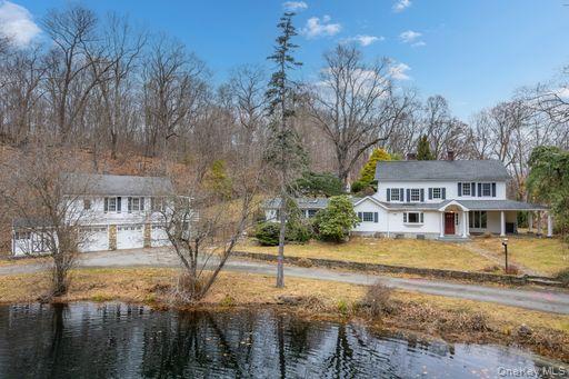Welcome to 82 Shingle House Road, a stunning 6.9-acre mini-estate tuck...