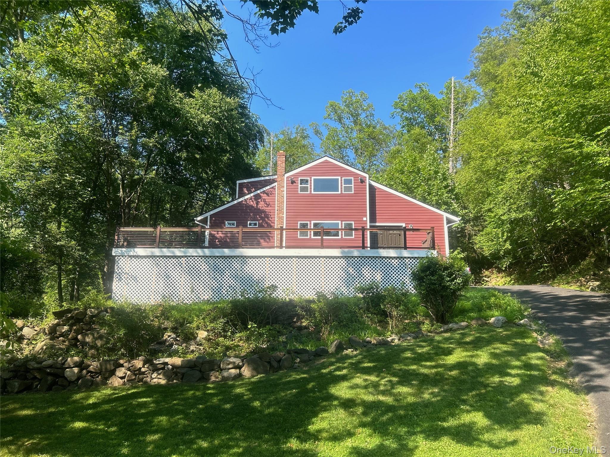 Discover this beautifully renovated home nestled on over 2 acres of lu...