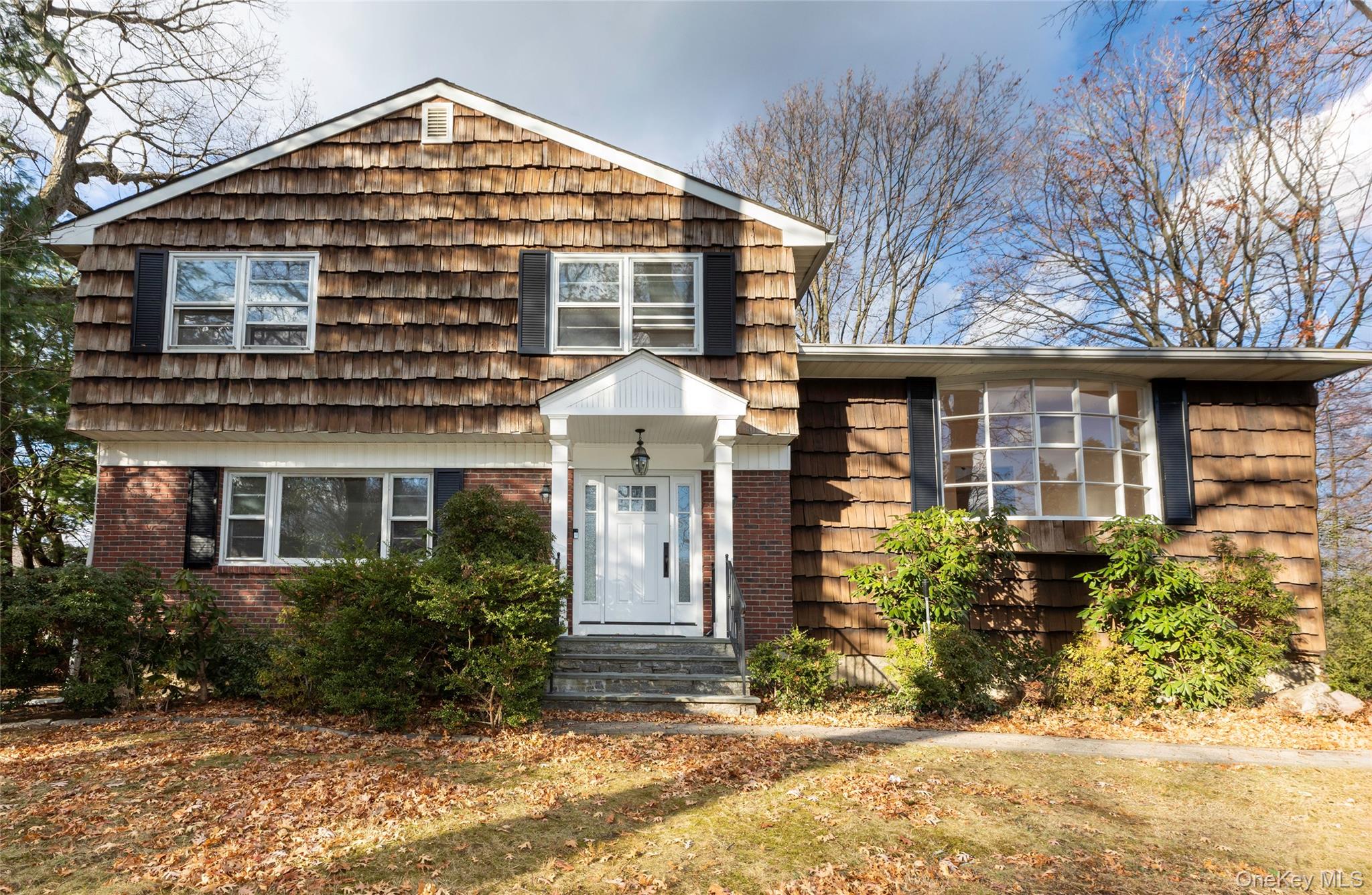 Welcome to 14 Theresa Lane, Harrison, NY — a beautifully maintained an...