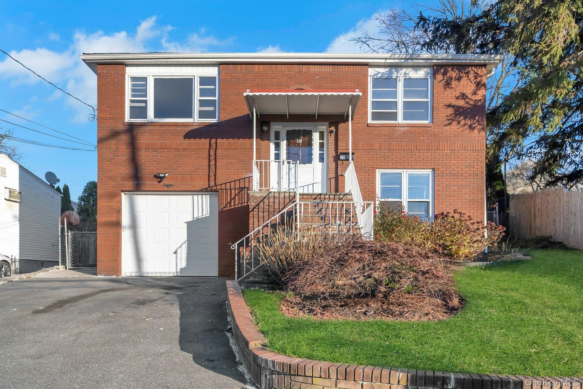 Opportunity awaits in this 5+ bedroom brick duplex with in-law set-up...