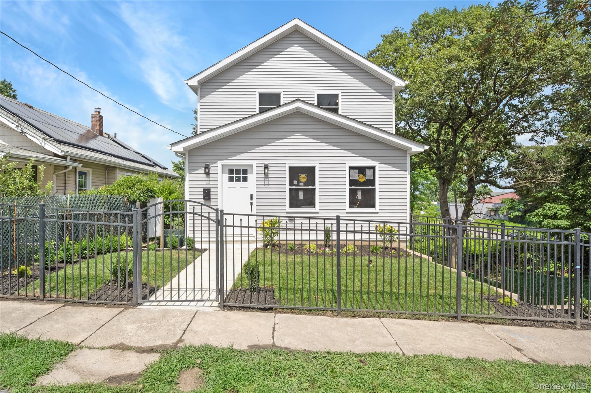 Welcome to a totally renovated, move-in ready home in one of New Roche...
