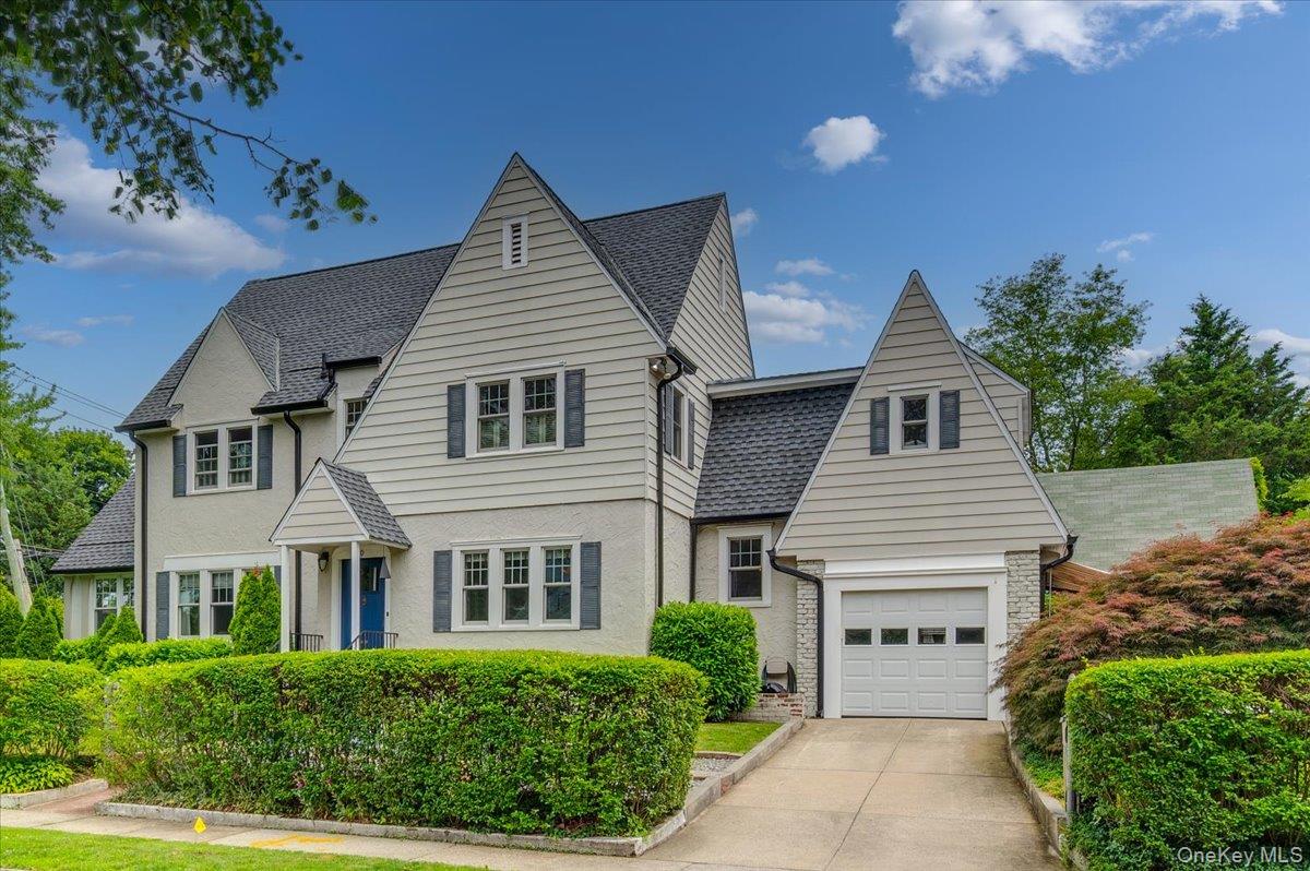 Welcome home to Pelham Manor, this classic center-hall home offers bea...