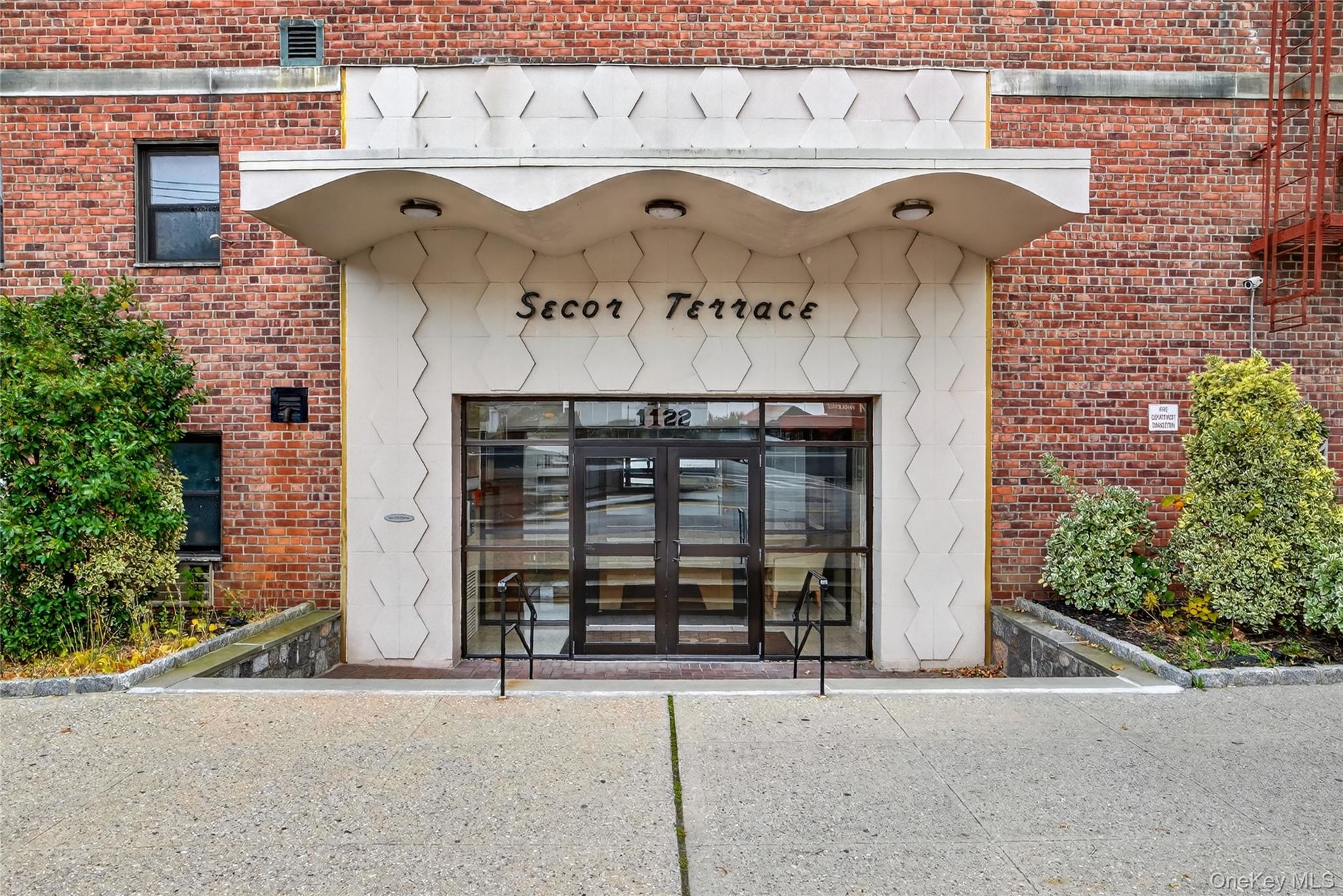 The Secor Terrace building at 1122 Yonkers Ave in Yonkers, is a mid-ri...