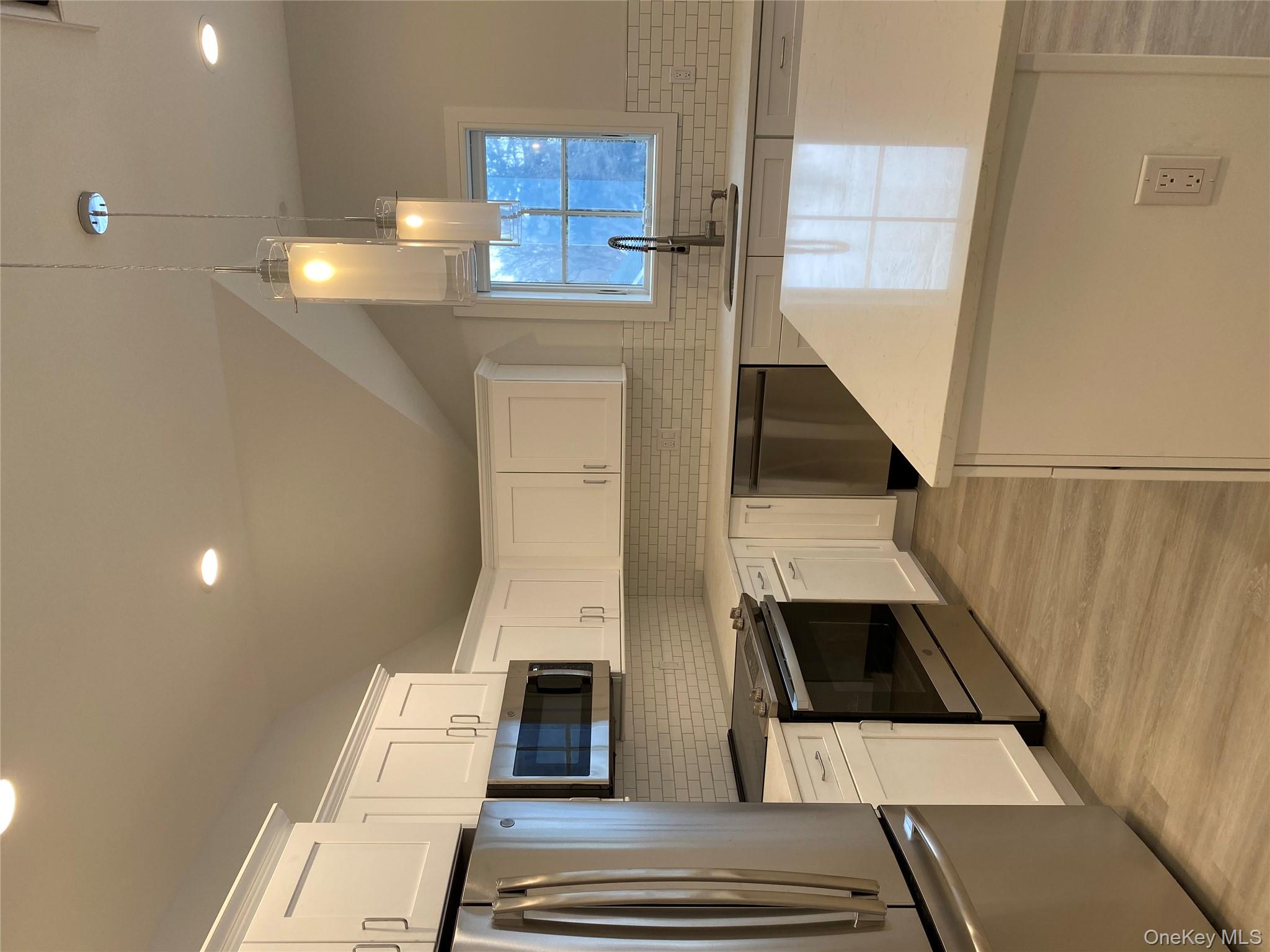 This lovely 2 bedroom, 2 bath end unit offers views of wooded area.  T...