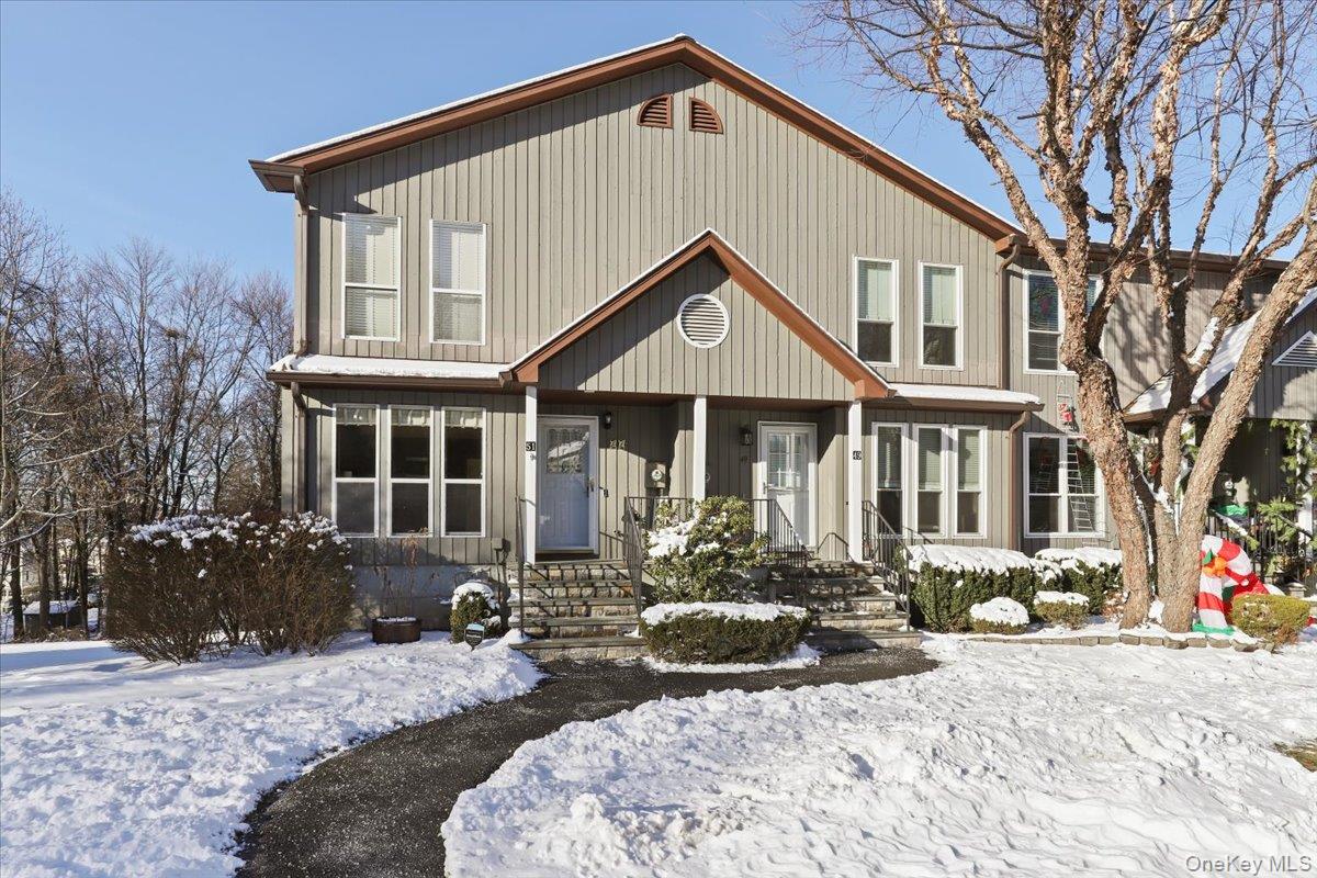 Welcome to this beautifully maintained end-unit townhome in the desira...