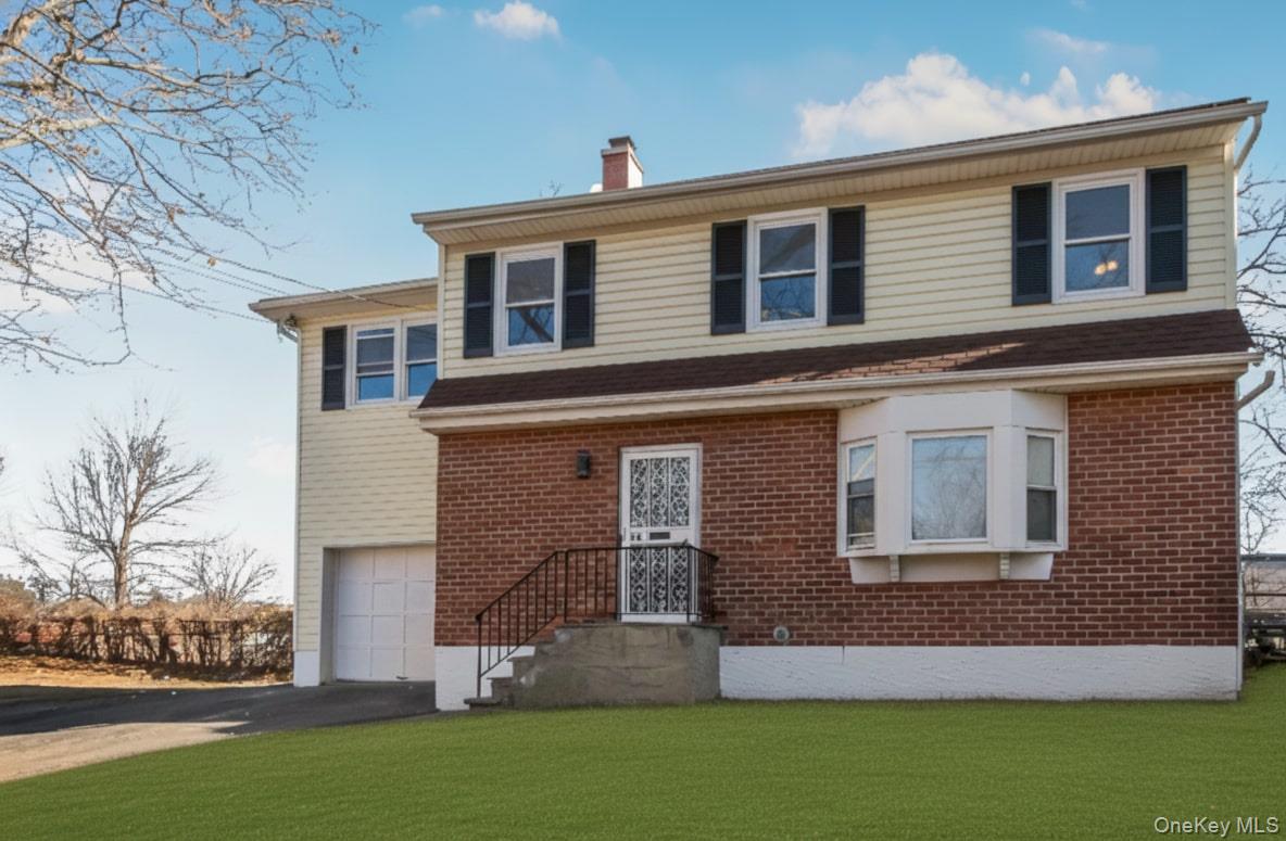 Welcome to 445 Franklin Avenue, a beautifully updated two-family prope...