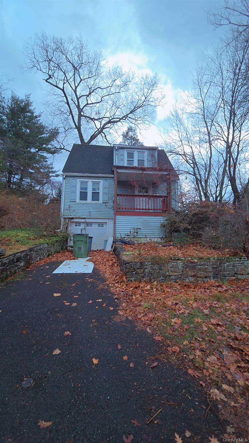 Charming 2-bedroom, 2-bath Cape-style home situated on a rare double l...