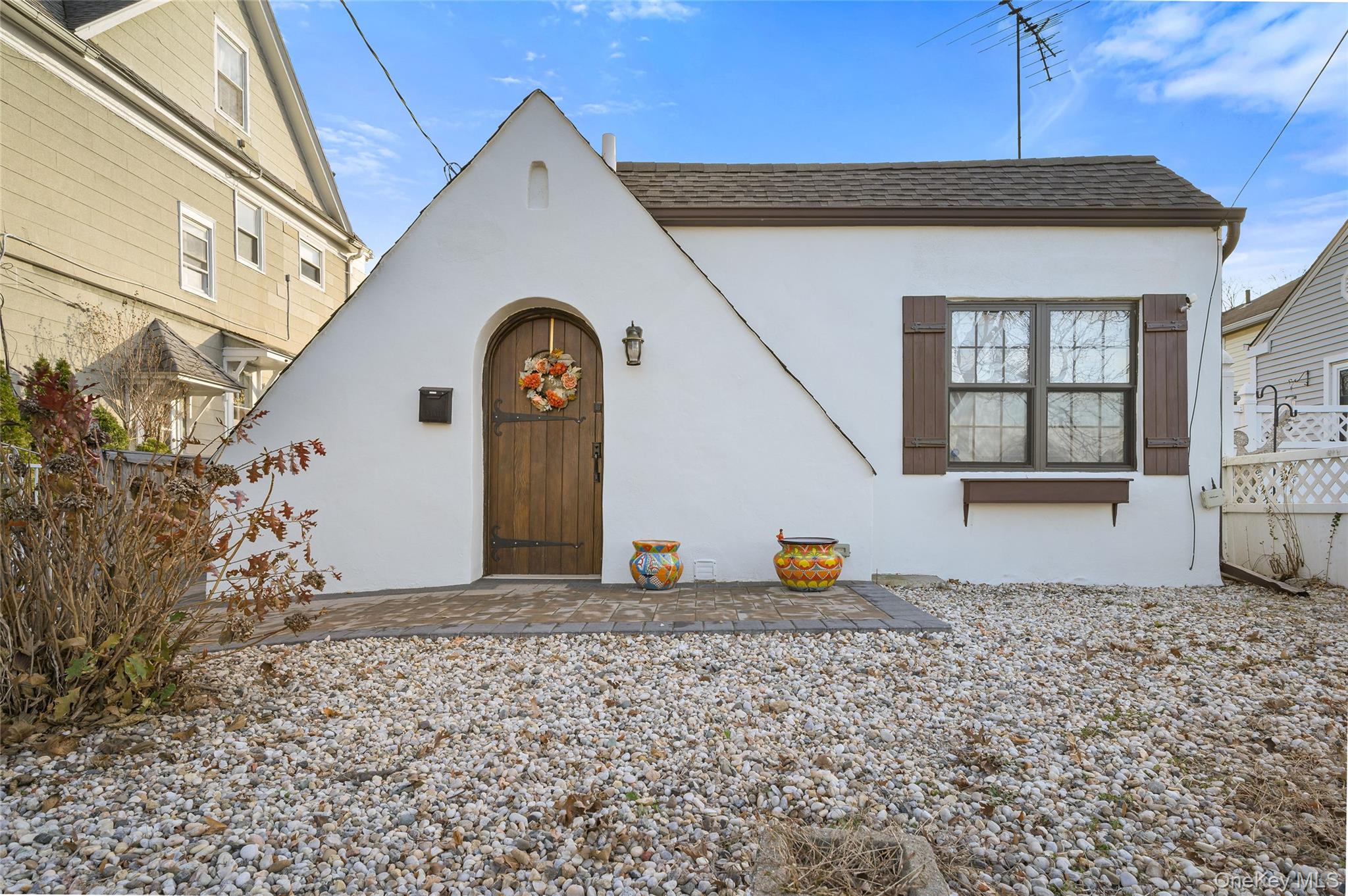 Enchanting and fully renovated 550 sq. ft. storybook cottage offering...