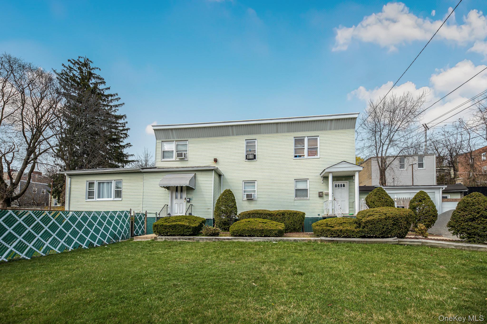 A wonderful Investment opportunity three family private home comes wit...