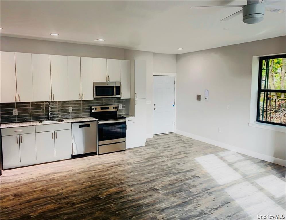 ***** COMPLETLEY RENOVATED ***** (870 SQFT) apartment! This top floor...