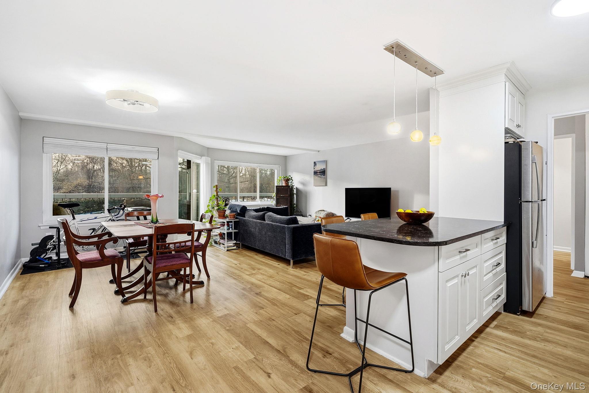 This 1-bedroom condo with a balcony is move-in-ready, with it's modern...