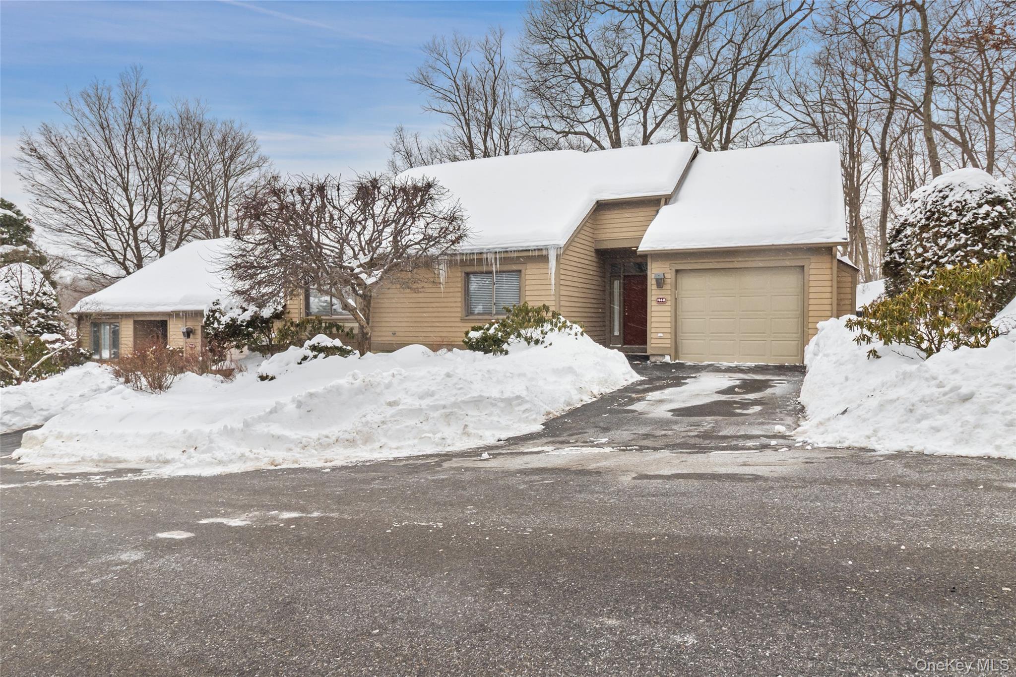 Rarely offered, single level, Stratford, end-unit set in a private, so...