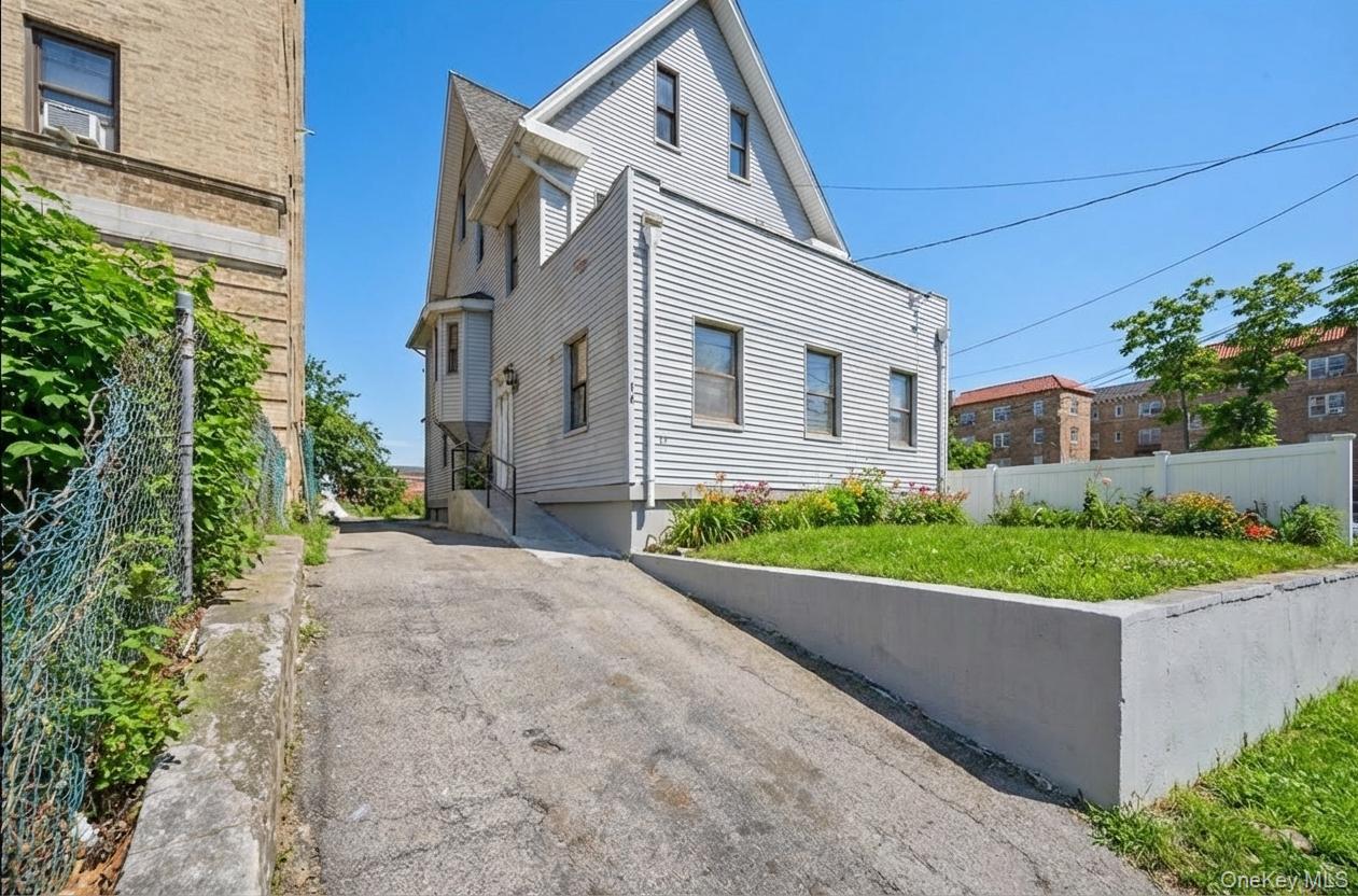 This is an excellent opportunity to own a fully renovated two-family h...