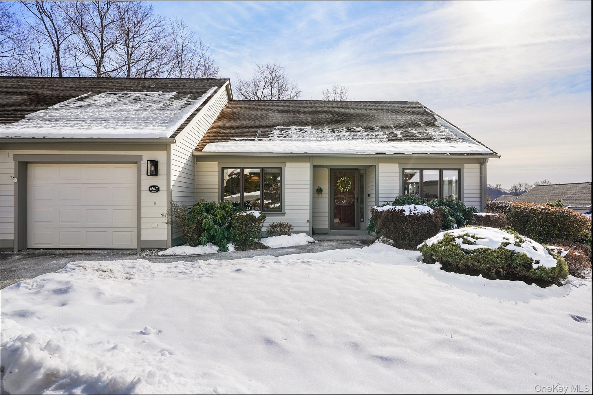 Wonderful and desirable, two-bedroom, two-bath, one-level Armonk end u...