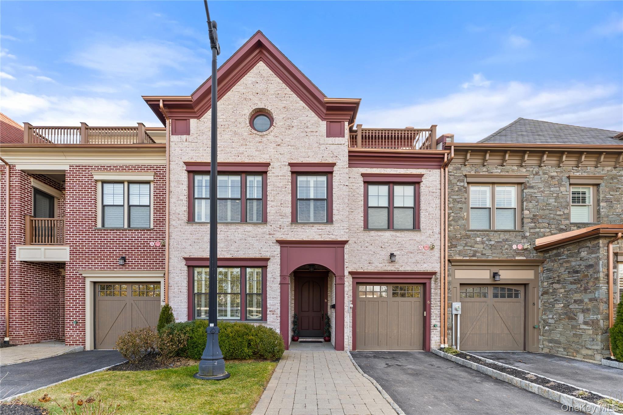 Enjoy effortless elegance in this rare Carriage House residence in the...