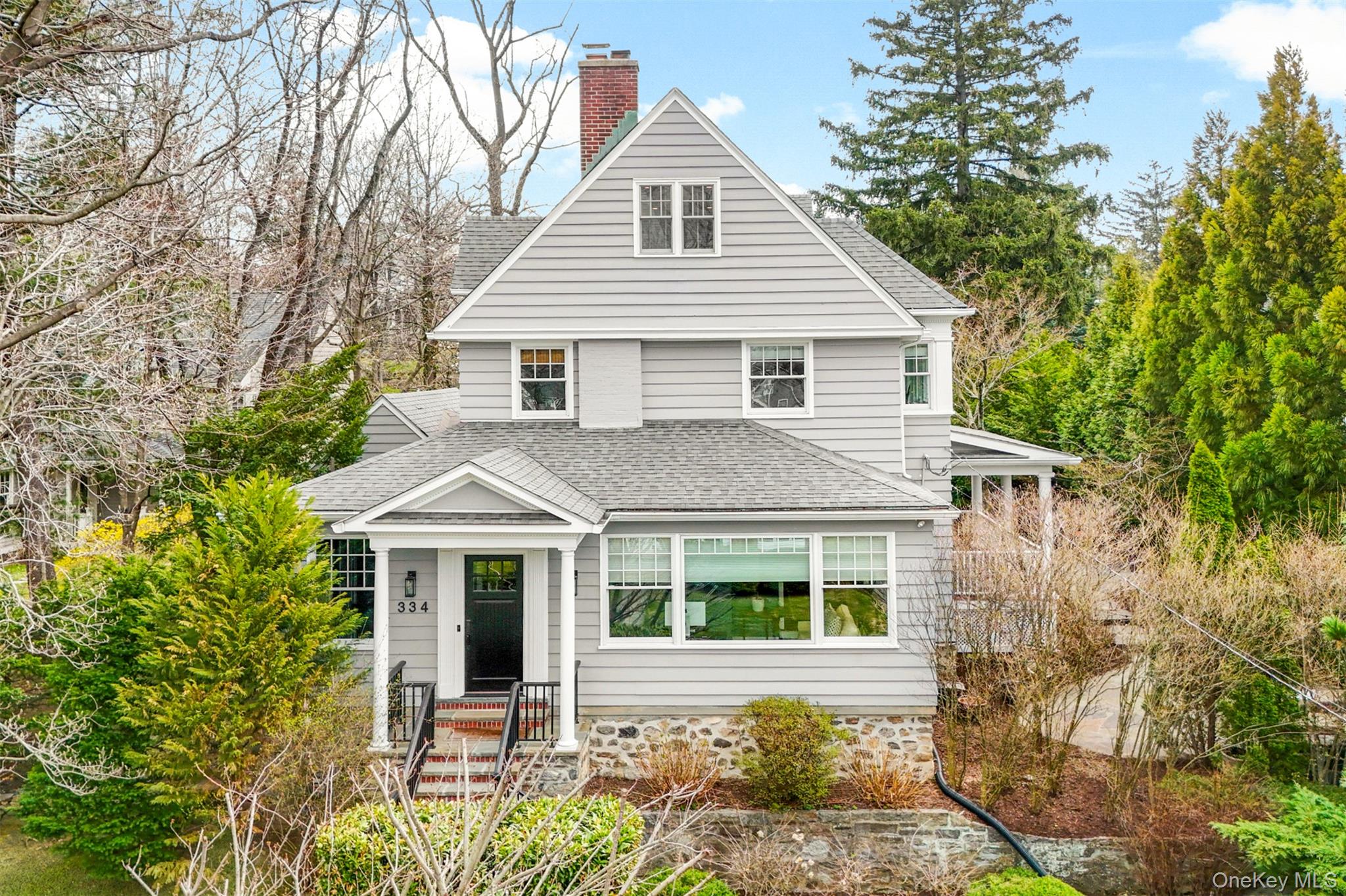 Perched majestically on a hill, 334 Highbrook Avenue offers a rare com...