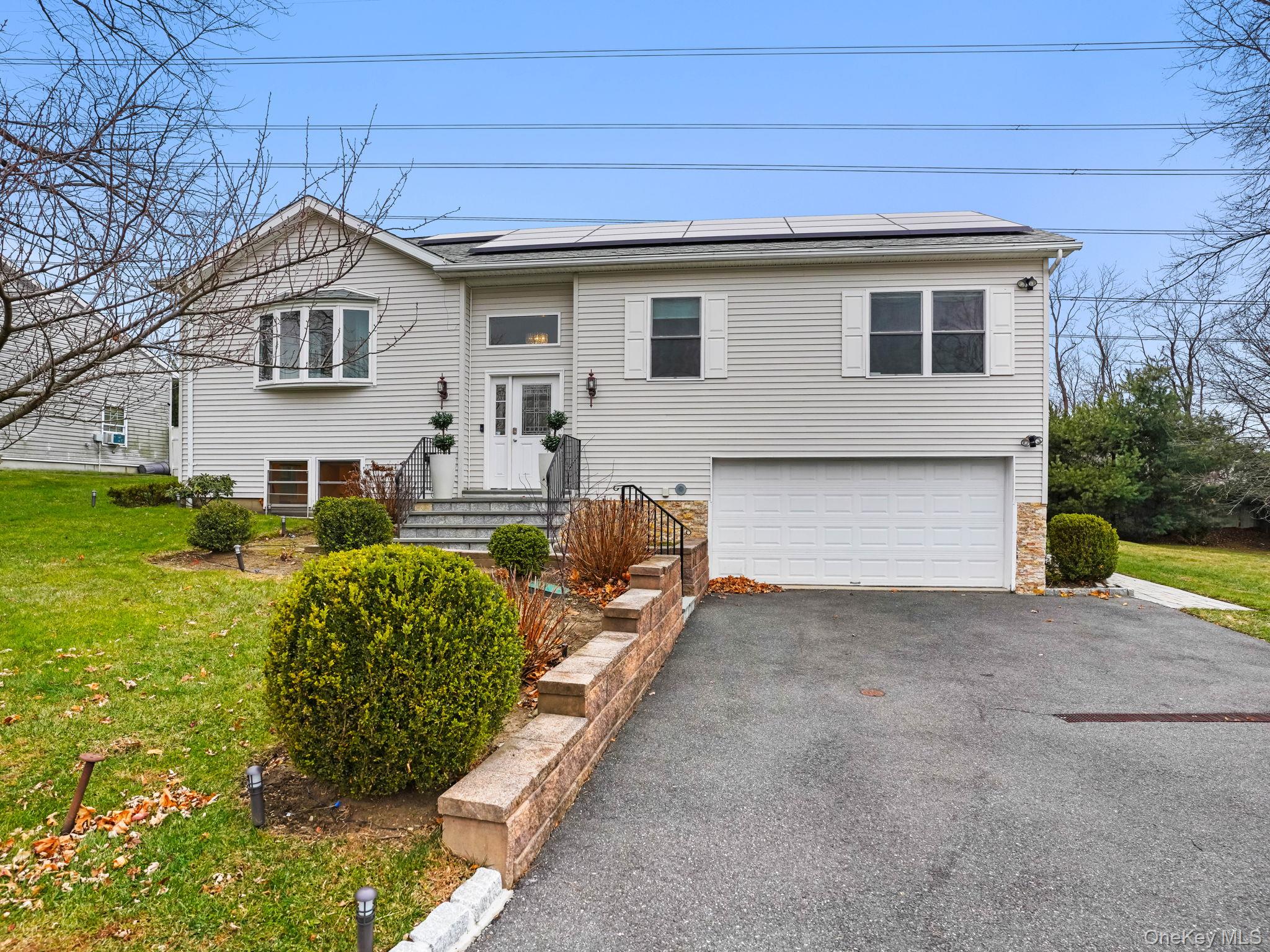 Welcome to 38 Kathwood Road! This beautifully updated raised ranch off...