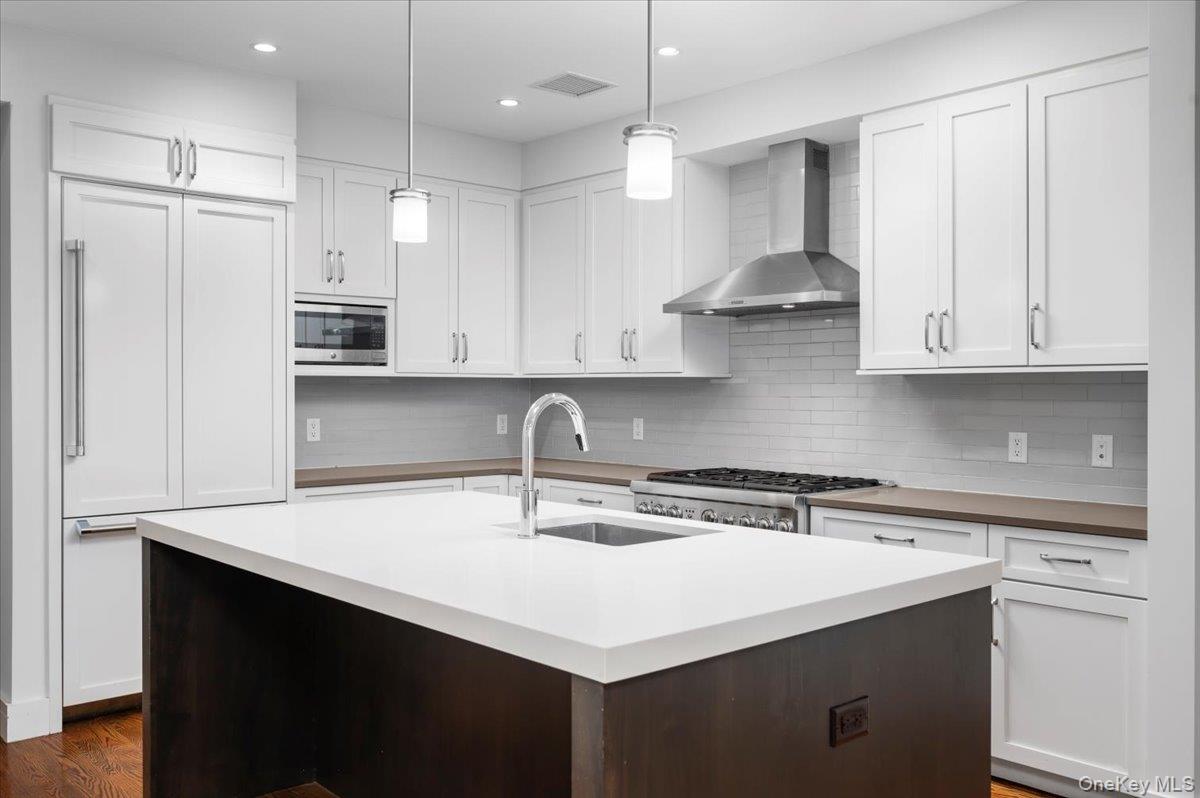 This stylish two-bedroom, two-bath home at Marina Court blends contemp...