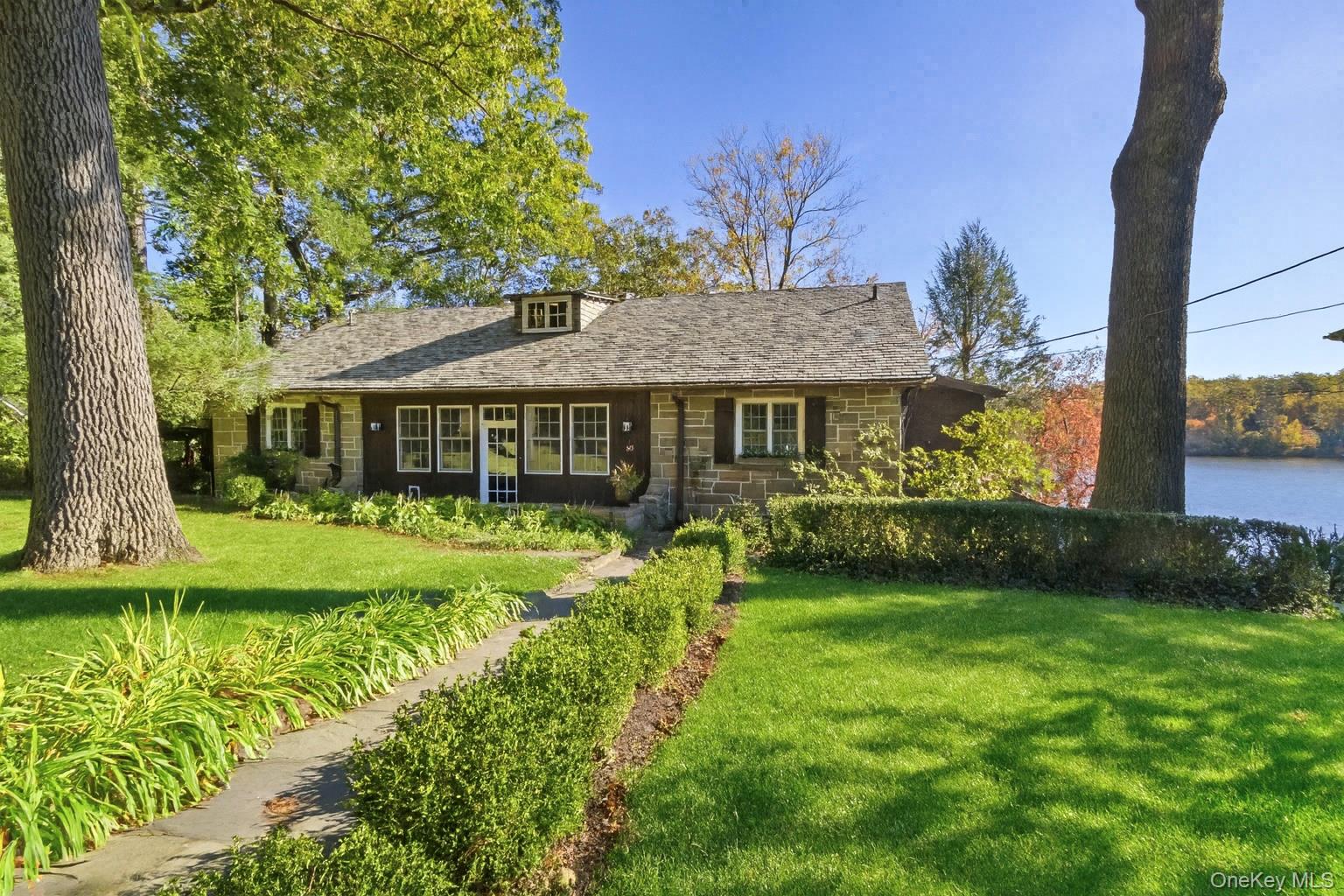 Set on the coveted waters of Lake Waccabuc, one of Northern Westcheste...