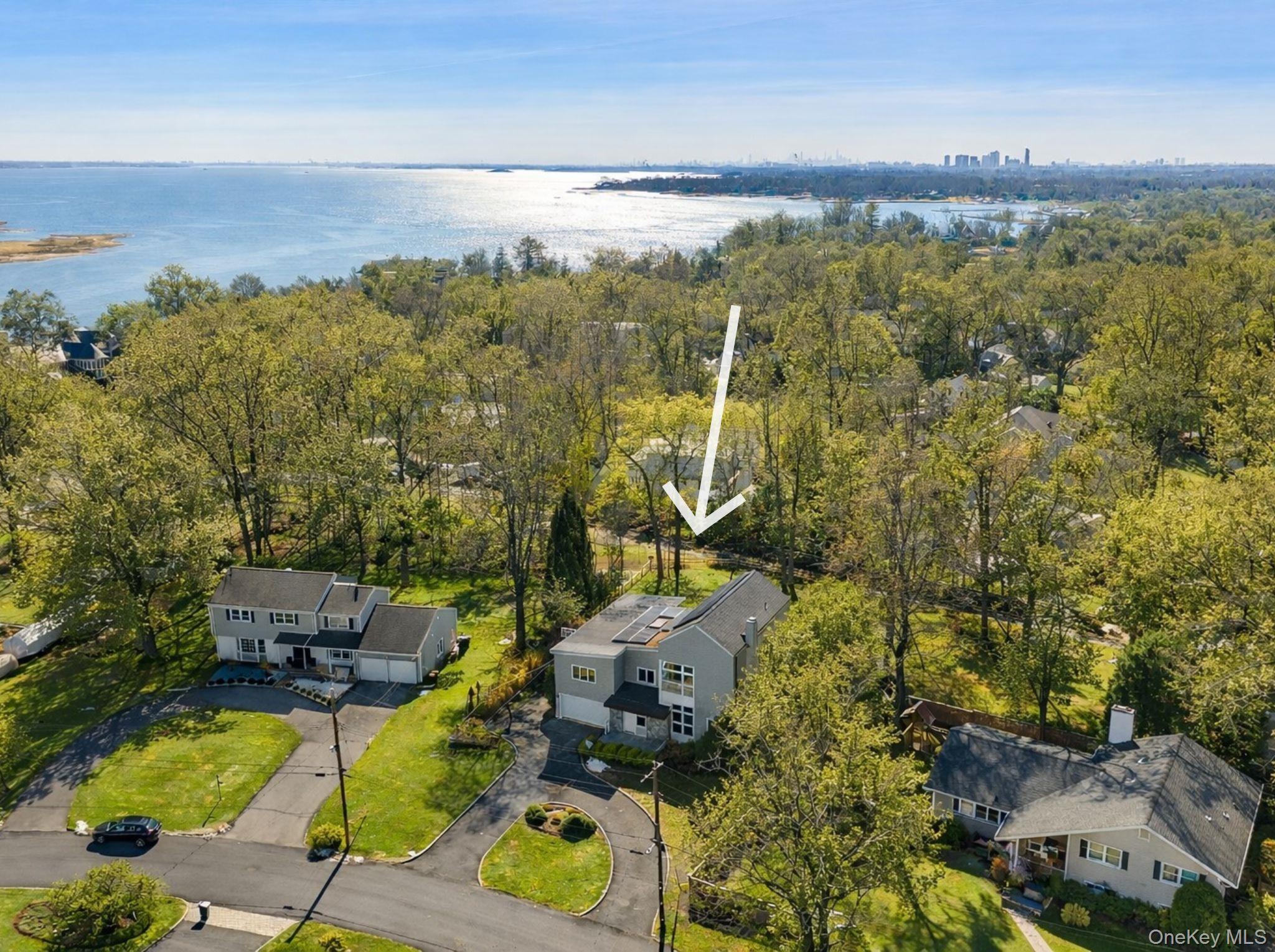 This Hamptons Modern Transitional style home is located on a cul-de-sa...