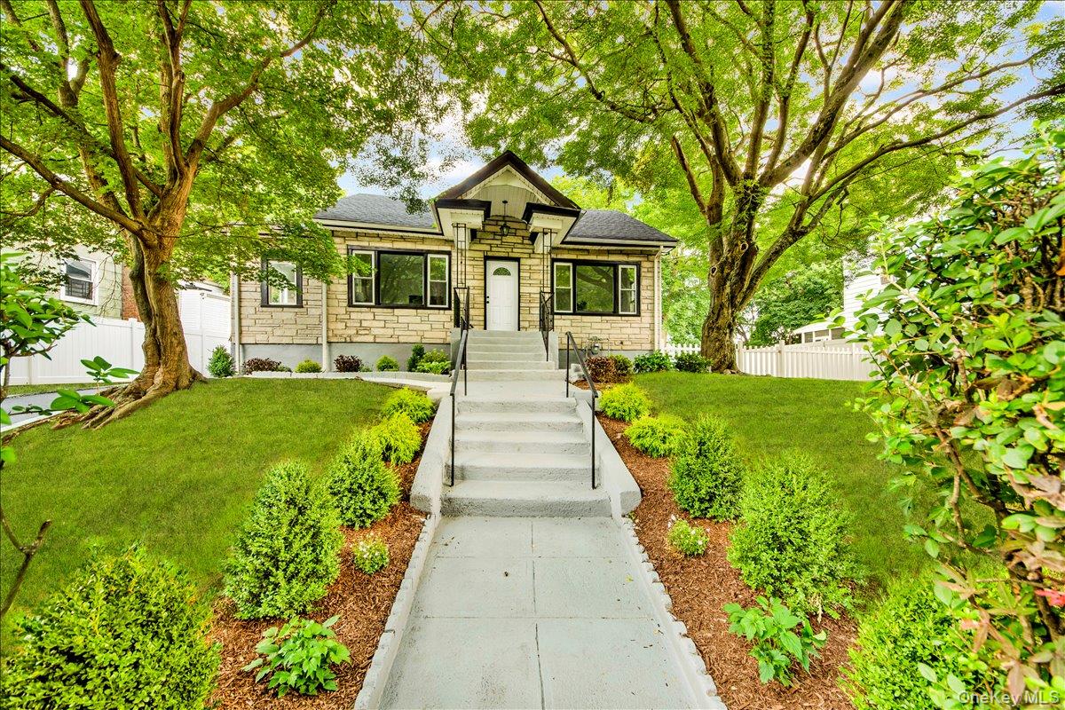 Refreshed, oversized cape home on an oversized lot in the Homefield-Ru...