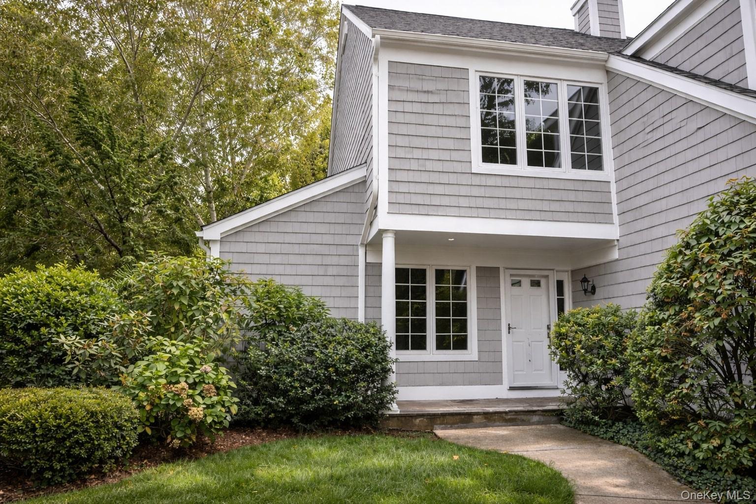 Rarely available Clarewood townhome in a charming Nantucket-style comm...