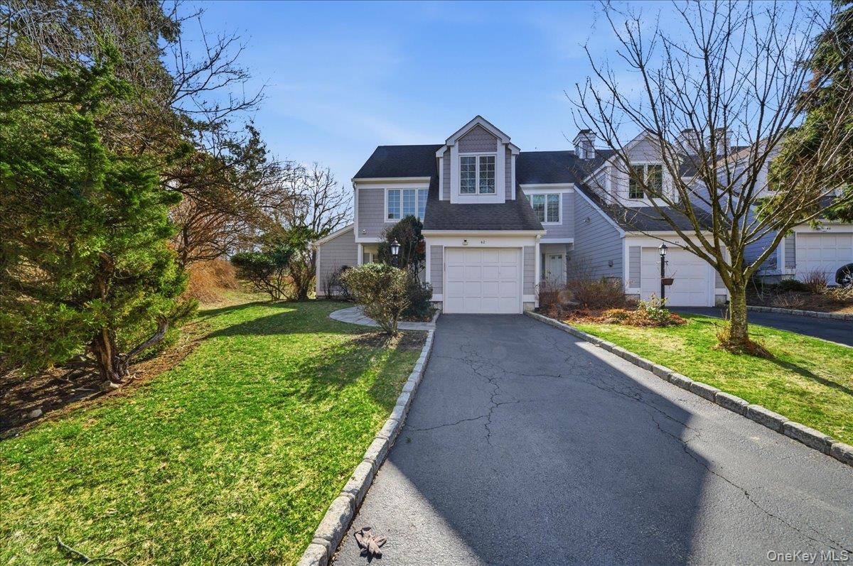 Rarely available Clarewood townhome in a charming Nantucket-style comm...