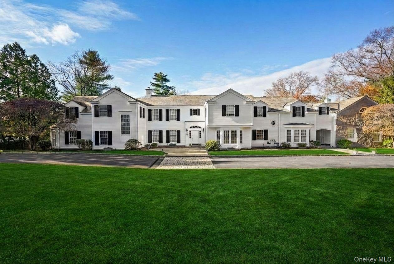 A true masterpiece of timeless design, this stately 5-bedroom, 7-bathr...
