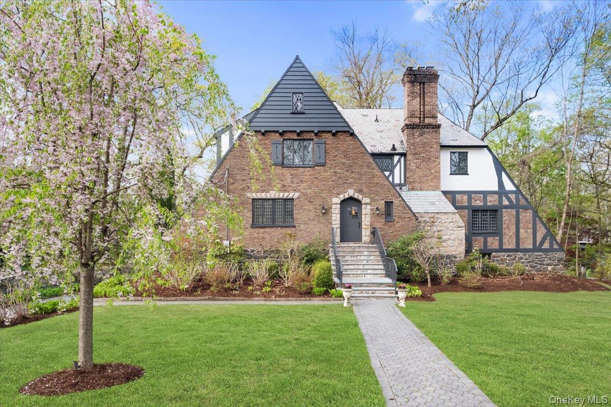 Stately, sun-filled Tudor on prime street in sought-after Larchmont Wo...