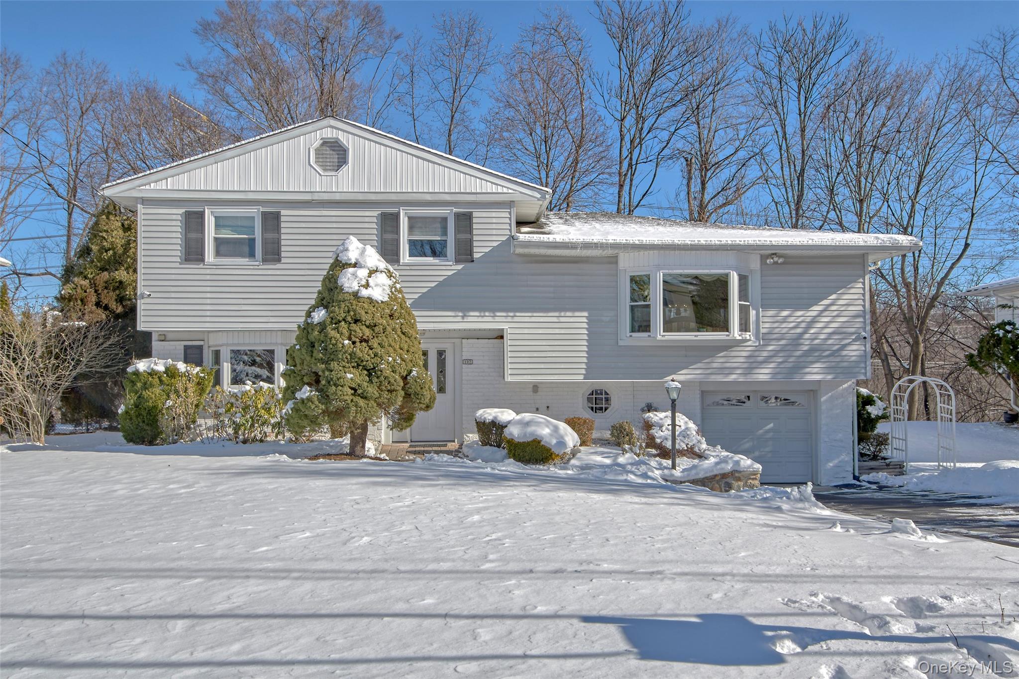 Welcome home to this delightful 3-bedroom, 2-full bathroom split-level...