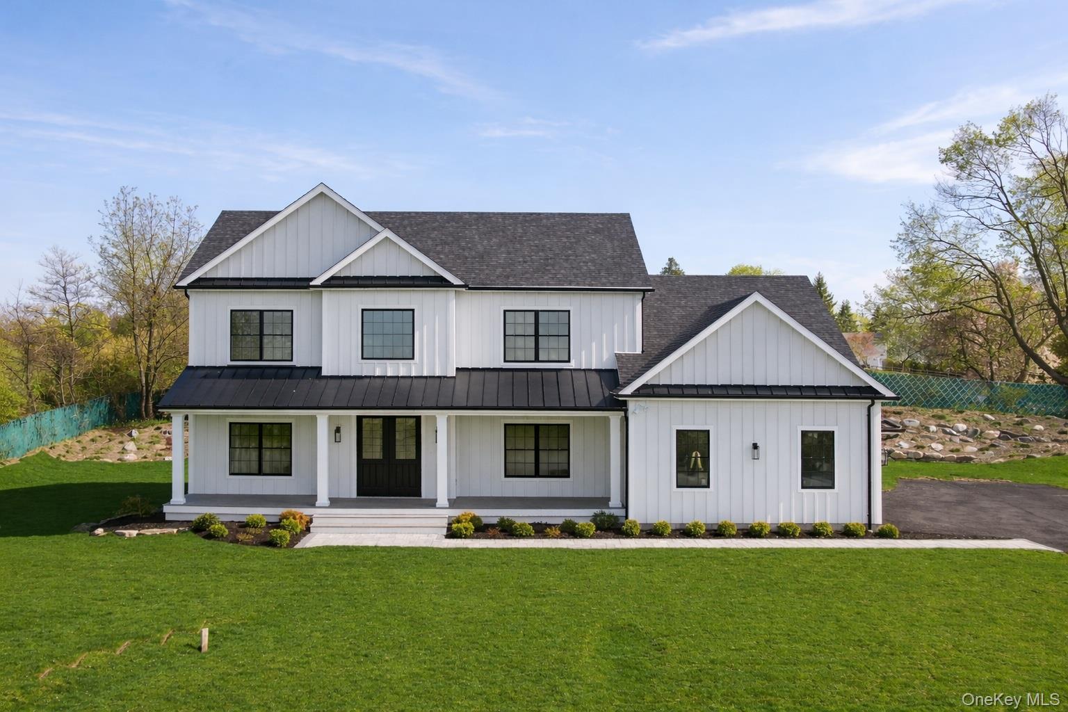 Experience refined new construction living at 41 Croton Dam Road, a th...
