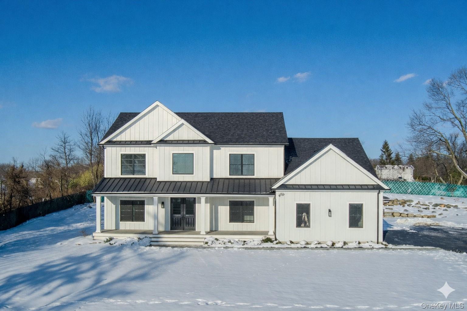 Experience refined new construction living at 41 Croton Dam Road, a th...