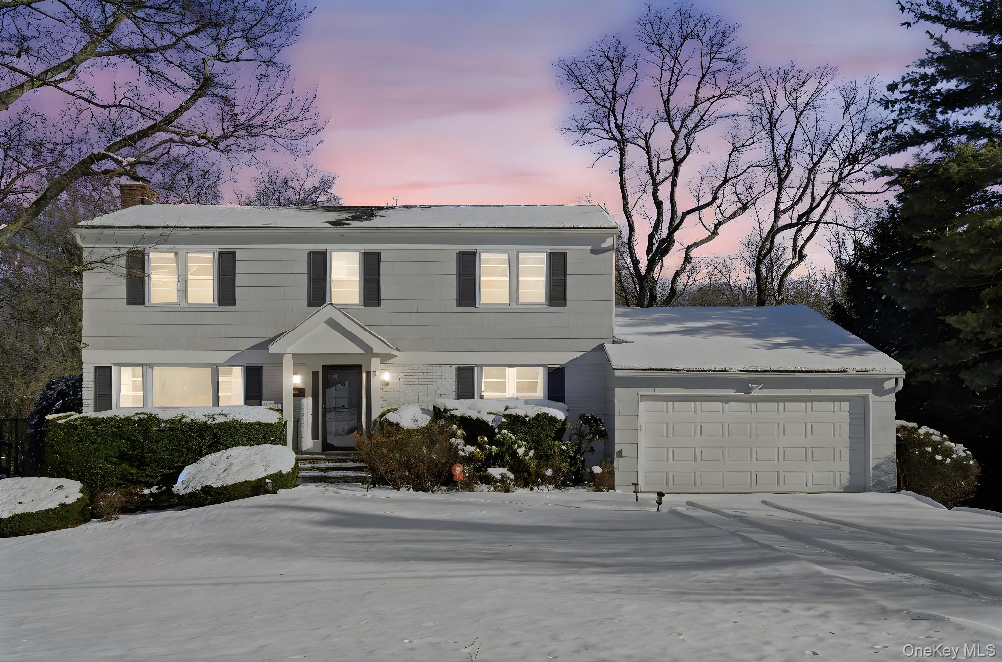 Experience the charm of this classic Center Hall Colonial, ideally sit...