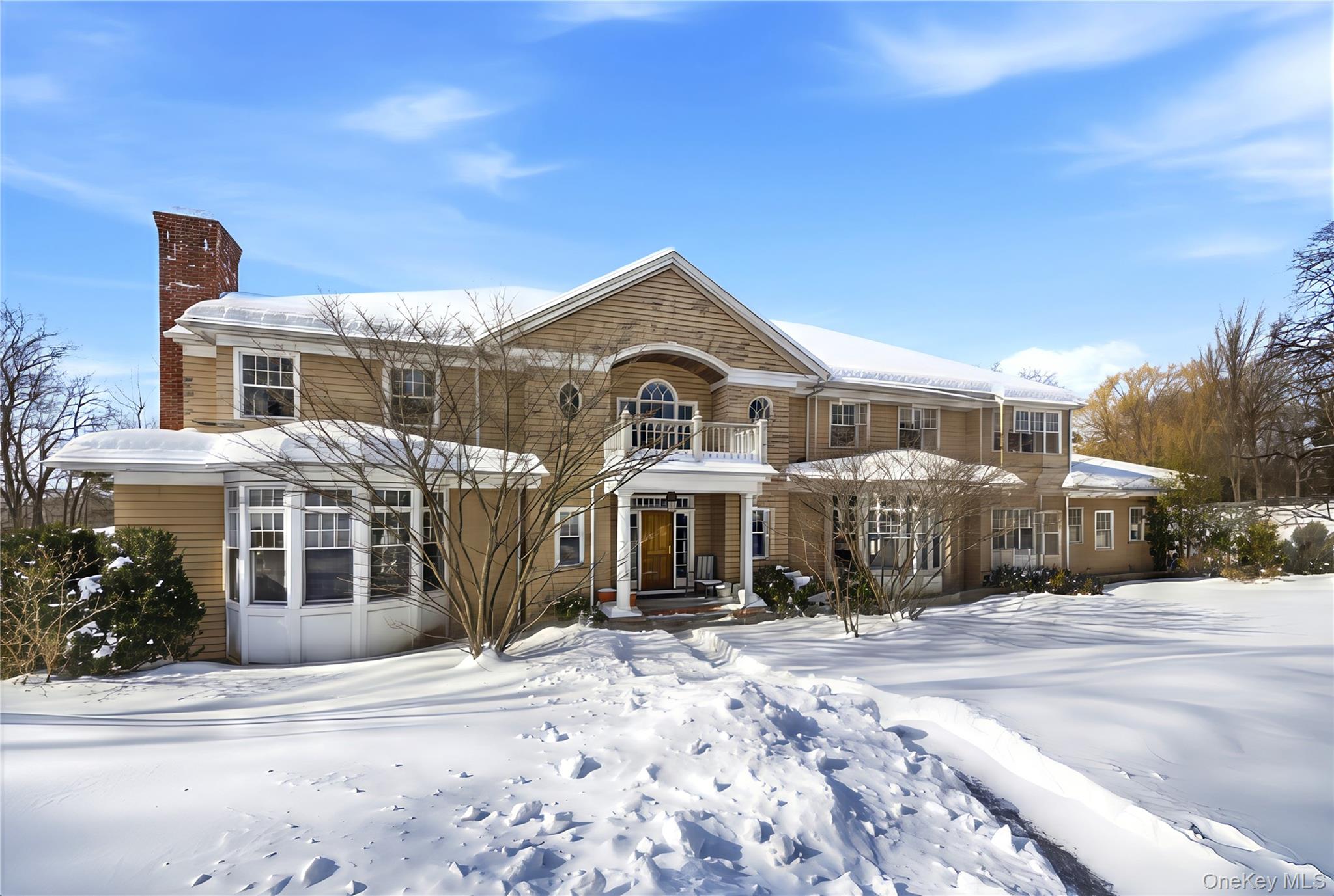 Welcome to 2 Lodge Road, an elegant 6-bedroom, 6-bath Colonial estate...