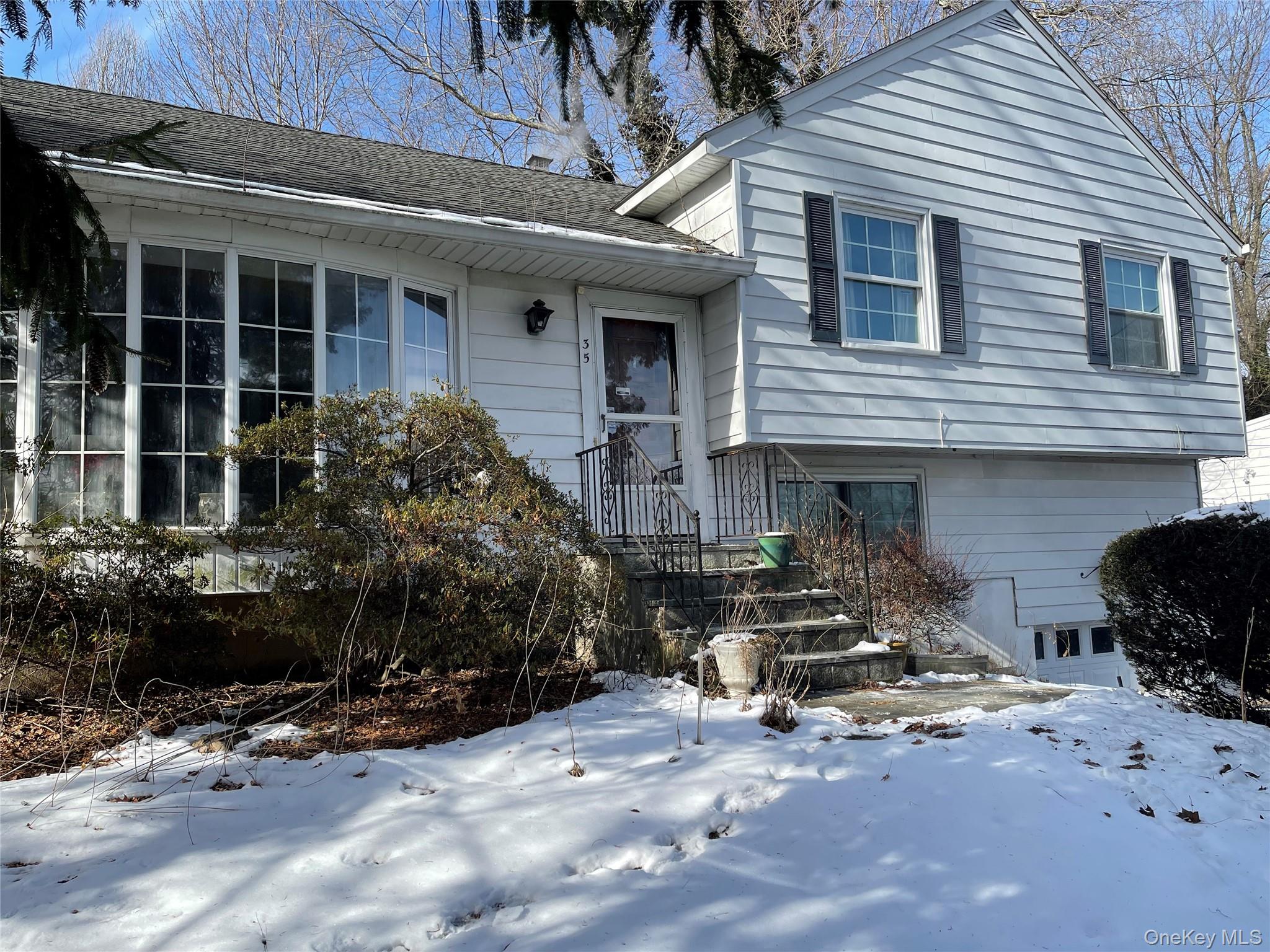 Three Bedroom Split Level in need of some updating.  Being sold strict...