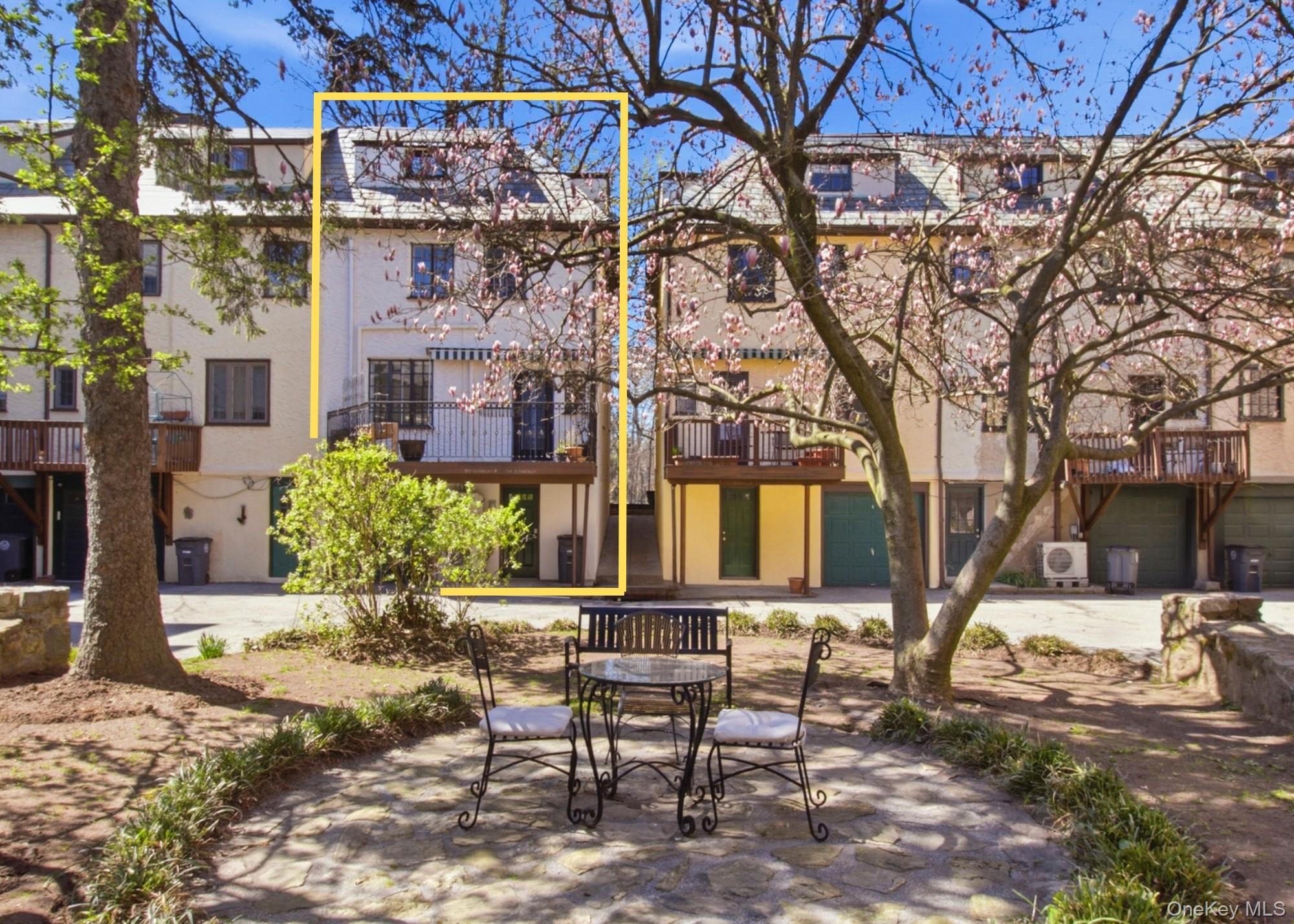 Beautifully updated masonry townhouse in the heart of Pelham Village....