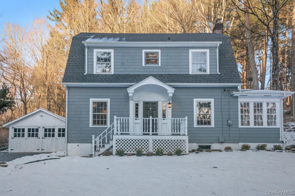 This classic center hall Colonial sits across the street, just steps f...