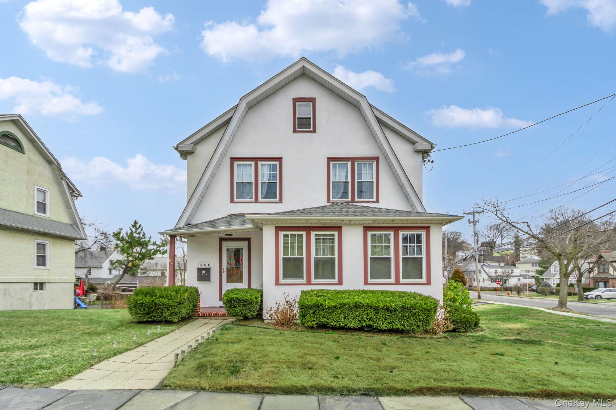 Welcome to this versatile two-family Dutch Colonial, ideally located o...