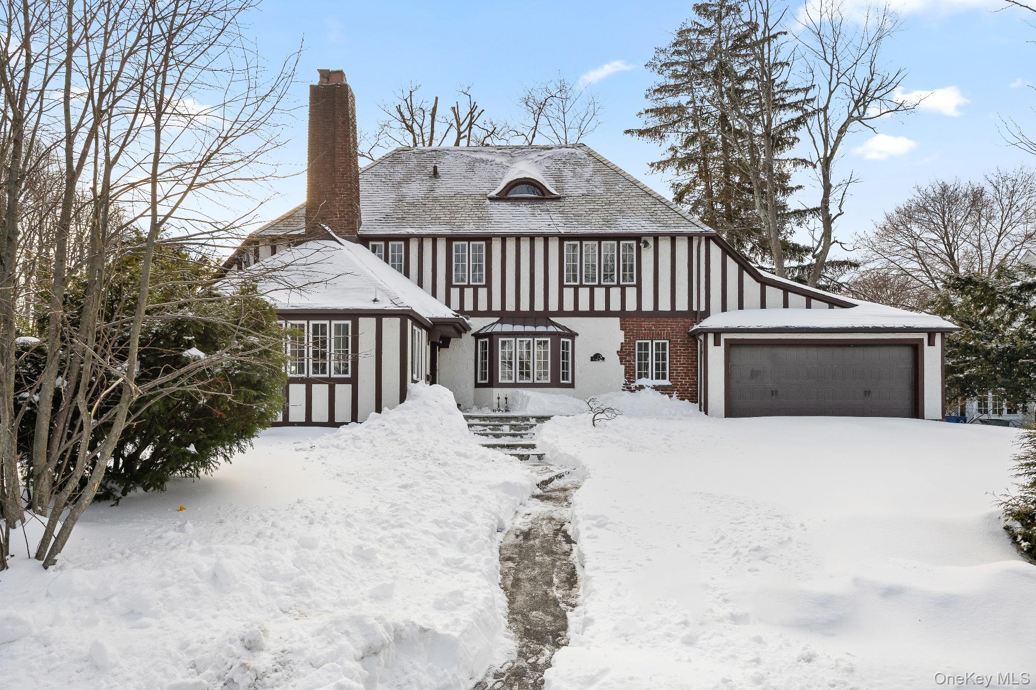 Exceptional sun-drenched Tudor, fully renovated and expanded in 2025,...