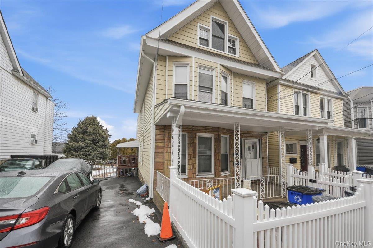 Spacious 3-bedroom, 1-bath apartment on the second floor of a well-mai...