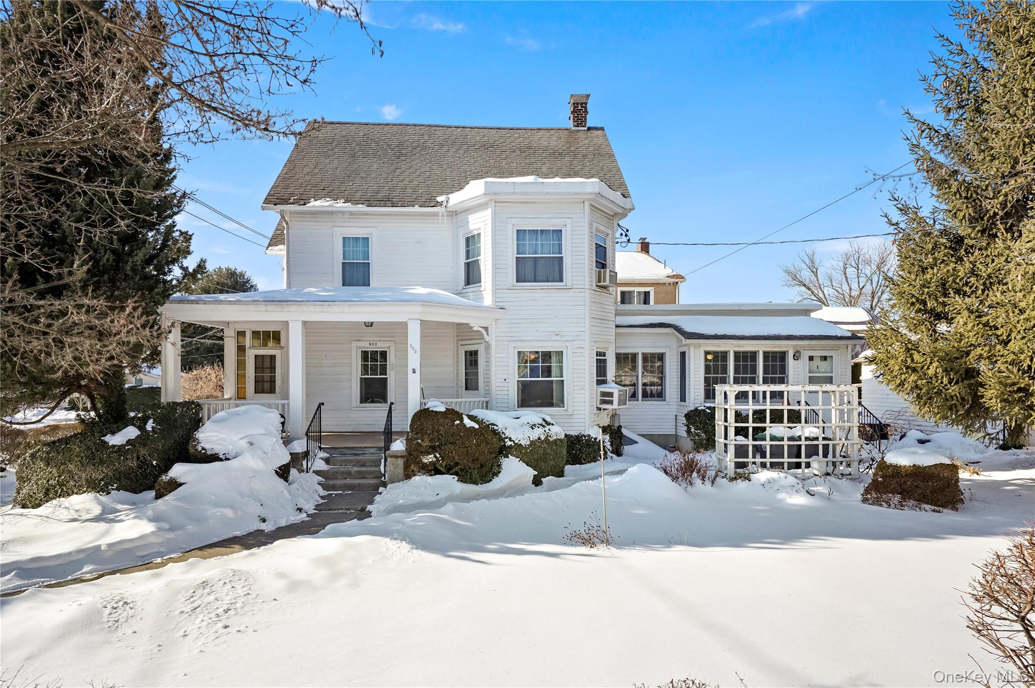 Situated on a prominent corner lot in the heart of Pelham, this classi...