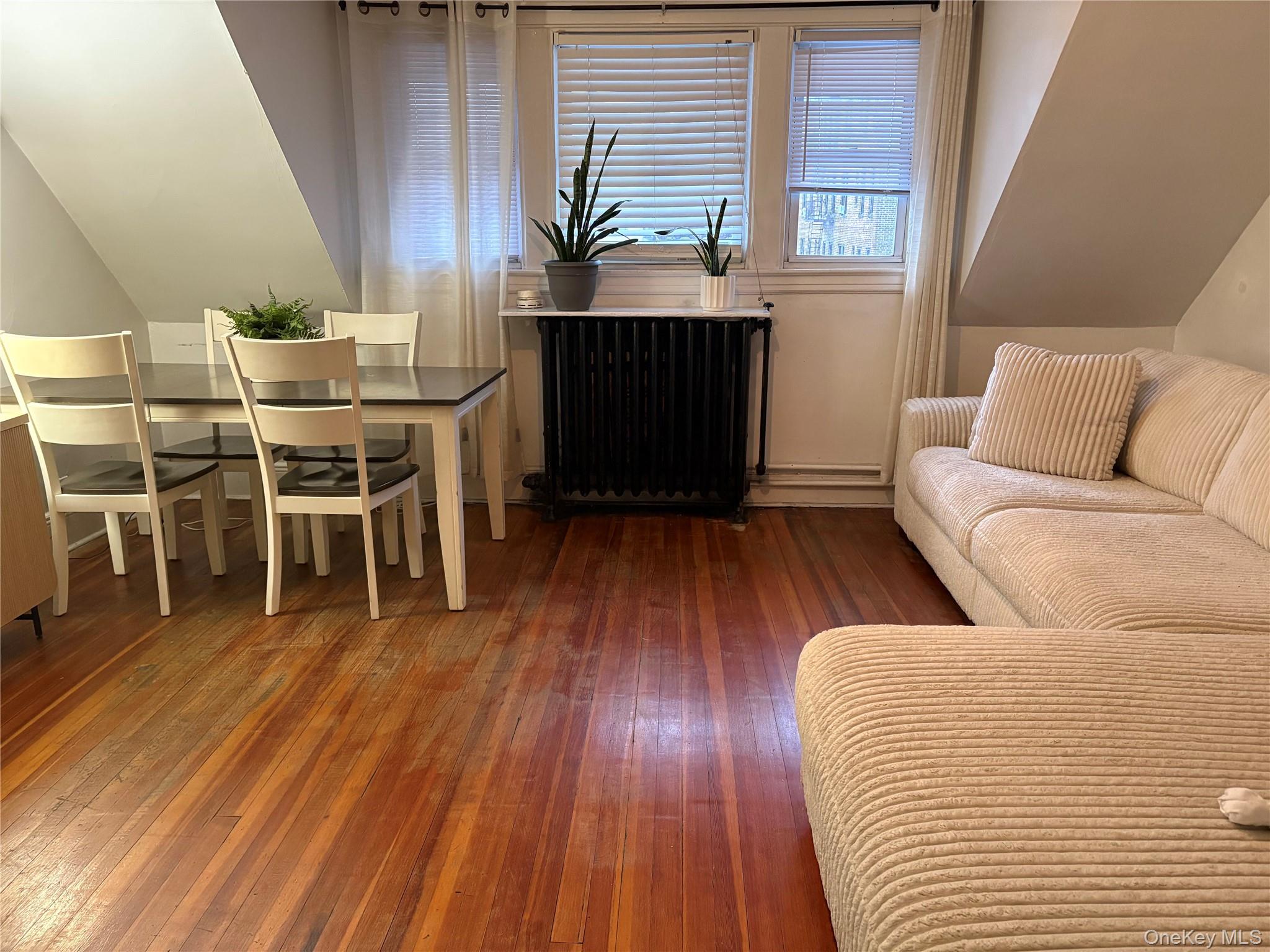Located on the top floor of a classic Yonkers triplex, 110 Elliott Ave...