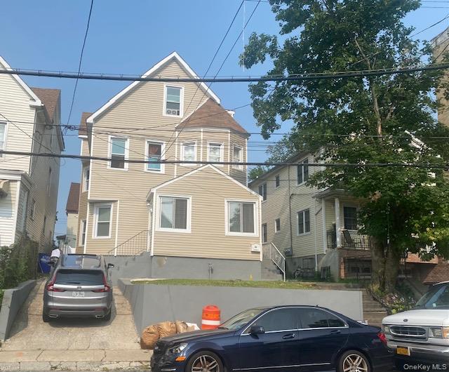 Two Family home 2/2  with Eat-on-kitchens, finished basement with sepa...