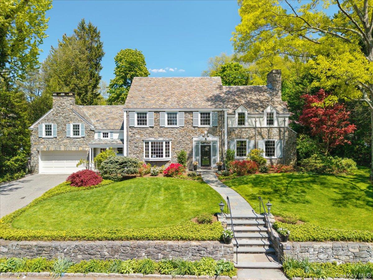 Set along a sought-after coveted Larchmont lane within the private cul...