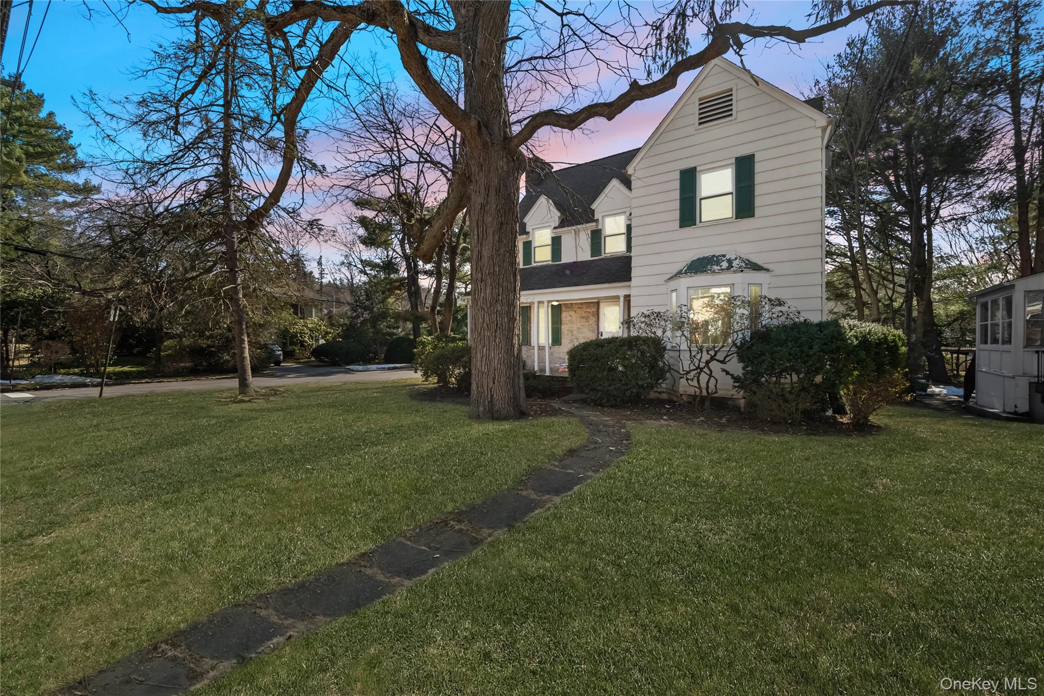 This storybook Hartsdale colonial 3 bedroooms,2- 1/5 bathrooms with fr...