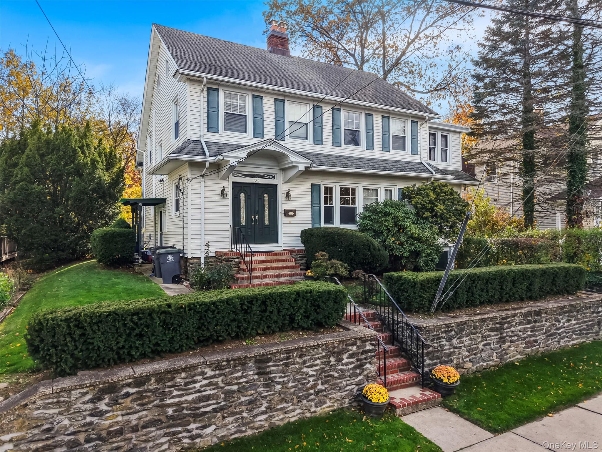 As if invited in by the sun itself, this charming 1923 Colonial is dre...