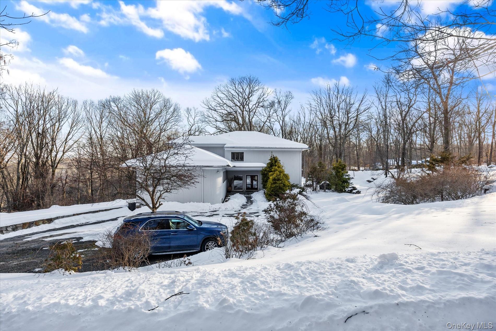 This magnificent residence embodies quintessential Bedford living, gra...