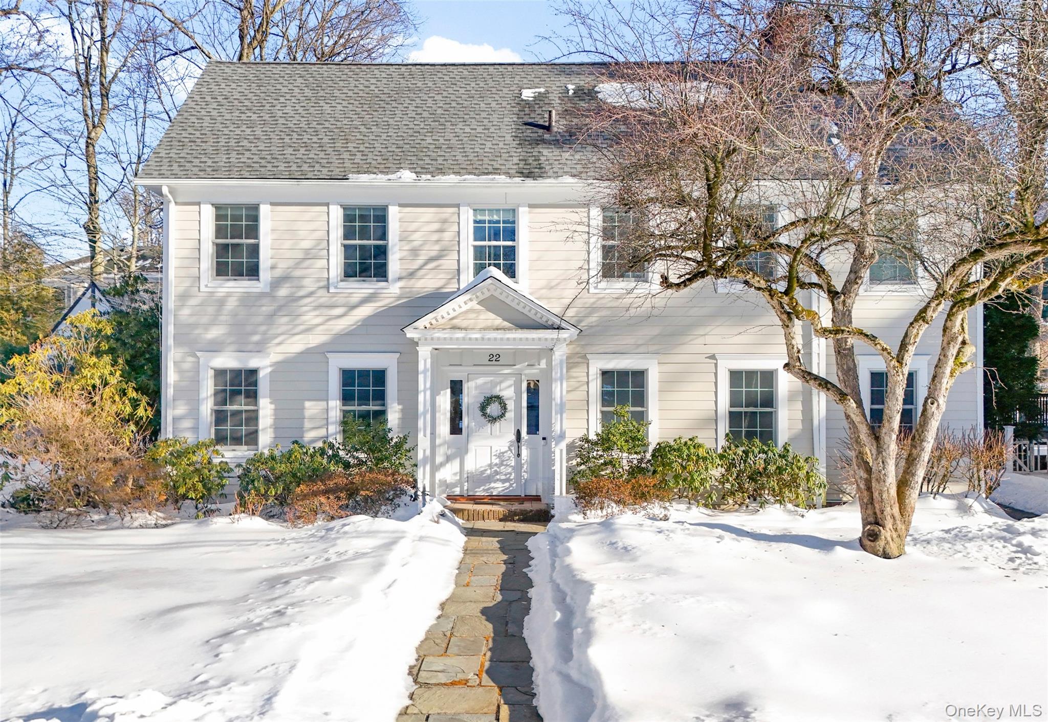 Welcome home to this truly special, light-filled Center Hall Colonial...