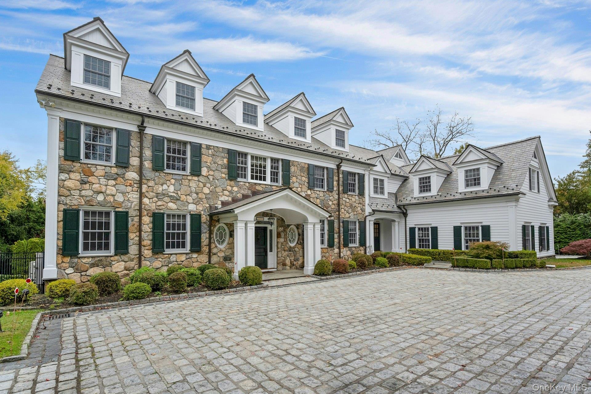 Magnificent stone and clapboard Colonial set on over an acre of beauti...